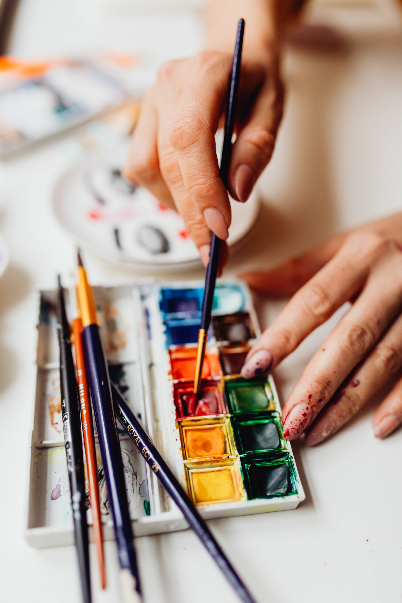 woman-painting-with-watercolors-picjumbo-com